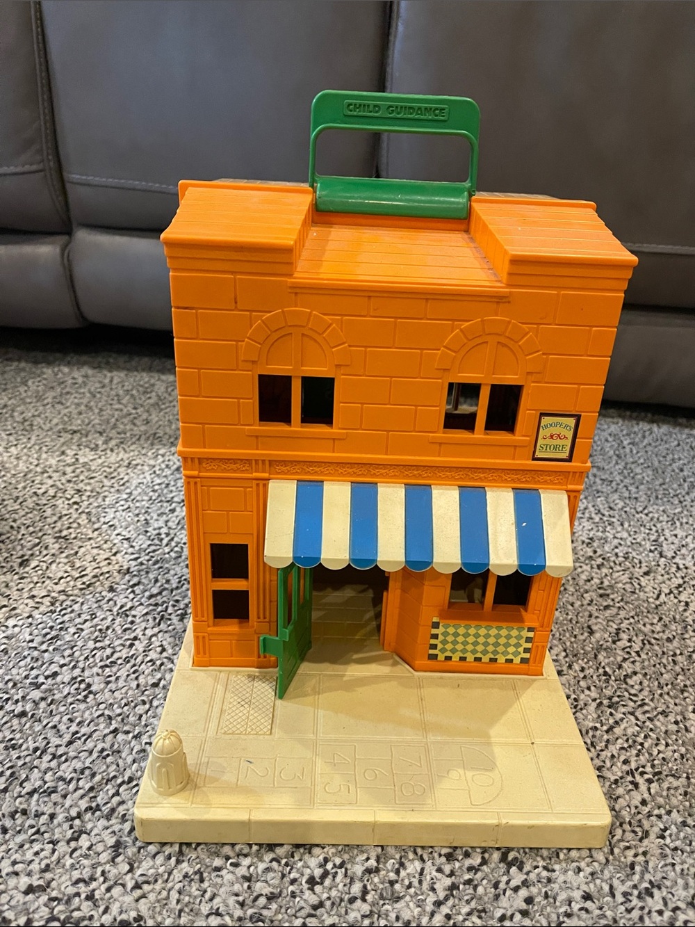 Orange Sesame Street Play Store with Blue & White Awning